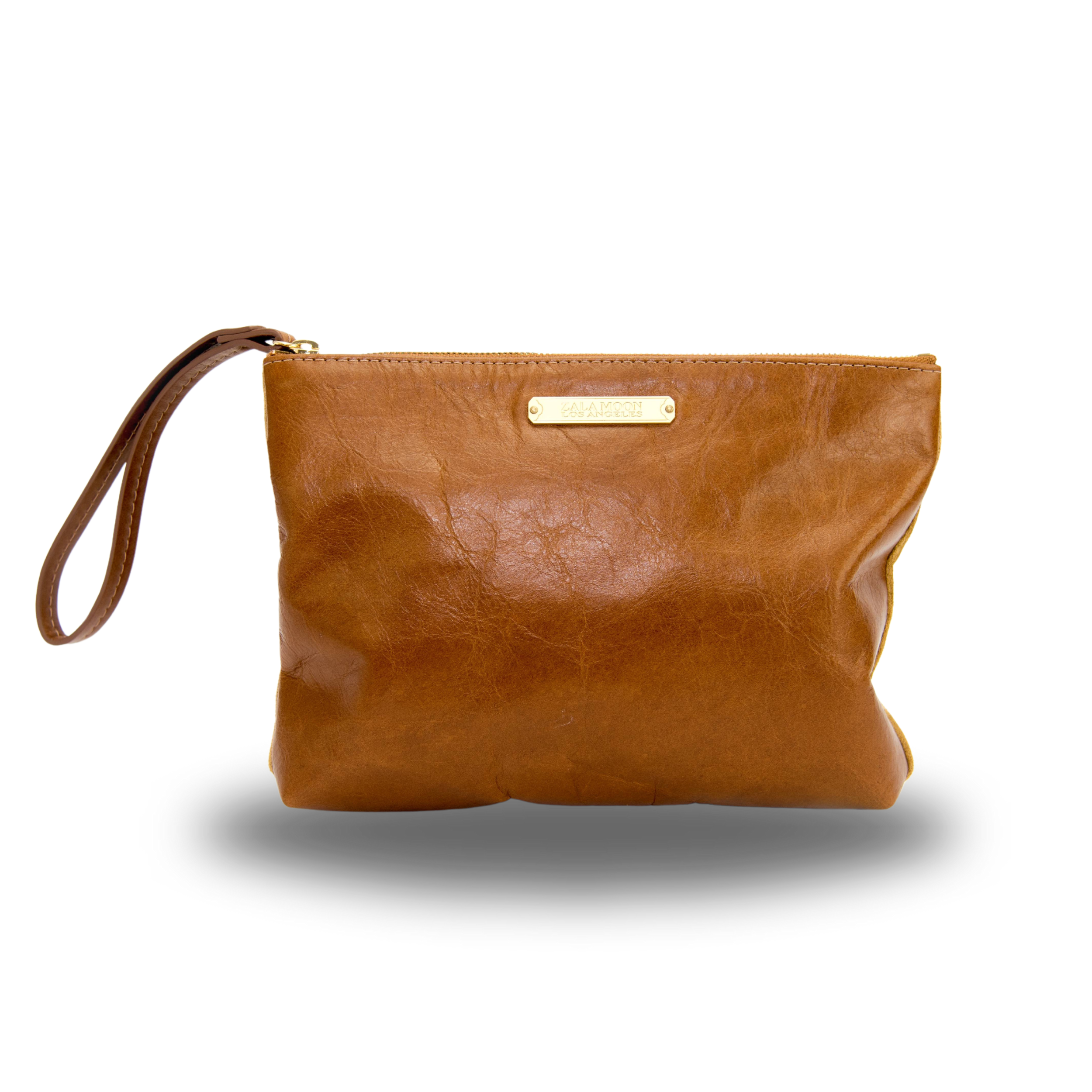 THE CARRY ON CLUTCH POLO TAN SUEDE